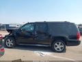 2011 Chevrolet Suburban — photo 15 of 17 | VIN 1GNSKJE34BR384401