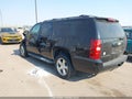 2011 Chevrolet Suburban — photo 3 of 17 | VIN 1GNSKJE34BR384401