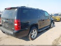 2011 Chevrolet Suburban — photo 4 of 17 | VIN 1GNSKJE34BR384401
