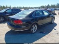 2013 Volkswagen Passat — photo 4 of 17 | VIN 1VWCM7A31DC147075