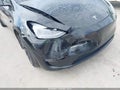 2023 Tesla Model Y — photo 6 of 19 | VIN 7SAYGDEF6PF895818