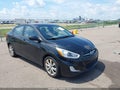 2014 Hyundai Accent — photo 1 of 16 | VIN KMHCU4AE1EU603182