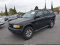 1999 Isuzu Rodeo — photo 2 of 17 | VIN 4S2CK58W8X4310806