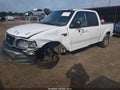 2002 Ford F-150 — photo 2 of 11 | VIN 1FTRW07682KE02288