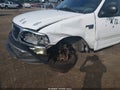 2002 Ford F-150 — photo 6 of 11 | VIN 1FTRW07682KE02288