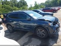 2016 Nissan Rogue — photo 13 of 16 | VIN 5N1AT2MV8GC776829