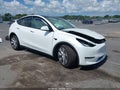2022 Tesla Model Y — photo 1 of 16 | VIN 7SAYGAEE7NF530194