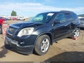 2009 GMC Acadia — photo 2 of 18 | VIN 1GKEV13D69J166711