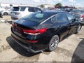 2019 Kia Optima — photo 4 of 17 | VIN 5XXGT4L39KG341353