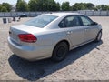 2014 Volkswagen Passat — photo 4 of 17 | VIN 1VWAH7A32EC007341