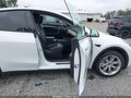 2022 Tesla Model Y — photo 5 of 21 | VIN 7SAYGAEEXNF520212