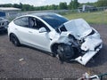 2022 Tesla Model Y — photo 1 of 17 | VIN 7SAYGDEFXNF445585