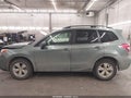 2014 Subaru Forester — photo 14 of 18 | VIN JF2SJAJC6EH501375
