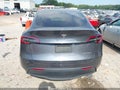2023 Tesla Model Y — photo 16 of 18 | VIN 7SAYGDEE4PF616244