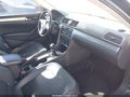 2014 Volkswagen Passat — photo 5 of 11 | VIN 1VWAT7A34EC044759