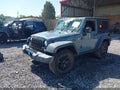 2015 Jeep Wrangler — photo 2 of 10 | VIN 1C4AJWAG6FL622125
