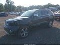 2015 Jeep Grand Cherokee — photo 2 of 16 | VIN 1C4RJECG8FC131825