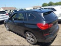 2017 BMW X1 — photo 14 of 17 | VIN WBXHT3C39H5F71217