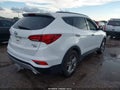 2017 Hyundai Santa Fe — photo 4 of 16 | VIN 5XYZUDLB7HG450377