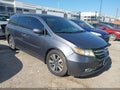 2014 Honda Odyssey — photo 1 of 16 | VIN 5FNRL5H90EB122056