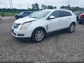 2015 Cadillac SRX — photo 2 of 17 | VIN 3GYFNEE39FS557884