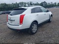 2015 Cadillac SRX — photo 4 of 17 | VIN 3GYFNEE39FS557884