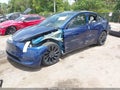2022 Tesla Model Y — photo 2 of 16 | VIN 7SAYGDEF1NF562617