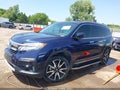 2022 Honda Pilot — photo 15 of 19 | VIN 5FNYF6H09NB025674
