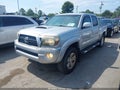 2011 Toyota Tacoma — photo 2 of 16 | VIN 5TFJU4GN7BX005143