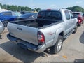 2011 Toyota Tacoma — photo 4 of 16 | VIN 5TFJU4GN7BX005143