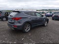 2018 Hyundai Santa Fe — photo 4 of 17 | VIN 5NMZTDLB0JH072966