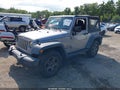 2015 Jeep Wrangler — photo 2 of 17 | VIN 1C4AJWAG0FL646193
