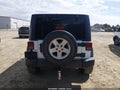 2013 Jeep Wrangler Unlimited — photo 16 of 17 | VIN 1C4HJWDG3DL542773