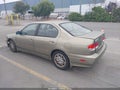 2001 Infiniti G20 — photo 3 of 11 | VIN JNKCP11A01T400399