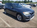 2014 BMW X1 — photo 19 of 20 | VIN WBAVM1C52EVW55307