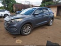 2016 Hyundai Tucson — photo 2 of 14 | VIN KM8J23A47GU159131