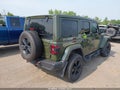 2021 Jeep Wrangler Unlimited — photo 4 of 17 | VIN 1C4HJXEGXMW622459