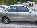 2004 Nissan Sentra — photo 13 of 16 | VIN 3N1CB51D34L897400