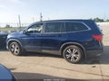 2016 Honda Pilot — photo 14 of 16 | VIN 5FNYF5H6XGB026642