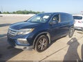 2016 Honda Pilot — photo 2 of 16 | VIN 5FNYF5H6XGB026642
