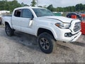2016 Toyota Tacoma — photo 1 of 16 | VIN 3TMCZ5AN7GM010476