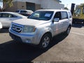 2009 Honda Pilot — photo 2 of 11 | VIN 5FNYF38419B009475