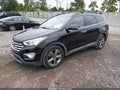 2016 Hyundai Santa Fe — photo 2 of 16 | VIN KM8SRDHF6GU164916