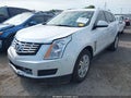 2015 Cadillac SRX — photo 2 of 16 | VIN 3GYFNBE33FS599997