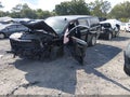 2019 Chevrolet Suburban — photo 2 of 16 | VIN 1GNSKHKCXKR400193