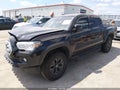 2021 Toyota Tacoma — photo 2 of 16 | VIN 5TFCZ5AN5MX277931