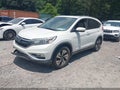 2016 Honda CR-V — photo 2 of 16 | VIN 5J6RM3H96GL032664