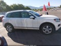 2011 Volkswagen Touareg — photo 13 of 16 | VIN WVGFF9BP8BD002495