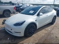 2023 Tesla Model Y — photo 2 of 14 | VIN 7SAYGDEF0PF778333