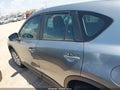 2014 Mazda CX-5 — photo 14 of 16 | VIN JM3KE2BEXE0339944